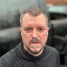 Mr. McKenzie recently visited Trooper 1 to speak with the crew who  airlifted him to the University of Maryland Shock Trauma last year after a  motorcycle accident. Master Trooper Krebs (left) and