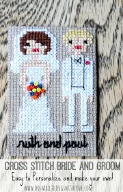 Download these star wars christmas themed patterns and stitch yourself some unique christmas decorations! Cross Stitch Bride And Groom 1 Catholic Sprouts Cross Stitch Wedding Cross Stitch Patterns Cross Stitching
