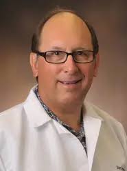 Dr. Garth Schooler, MD