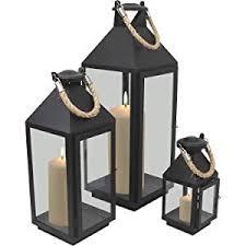 Eine gartenleuchte mit drei laternen, die für einen sicheren und dekorativen gartenweg sorgt. 3tlg Modisches Laternen Set In Schwarz H24 41 55cm Metalllaterne Gartenlaterne Laterne Windlicht Mit Aufhangung Me Laterne Garten Metall Laterne Laterne Aussen