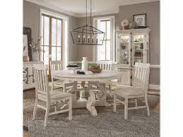 Find furniture & decor you love at hayneedle, where you can buy online while you explore our room designs and curated looks for tips, ideas & inspiration to help you along the way. Magnussen Home Bronwyn 5 Piece Farmhouse Dining Set With Round Table Reeds Furniture Dining 5 Piece Sets