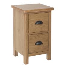 The bedside table is long and broad enough to accommodate a table lamp and other decor pieces. Childon Oak Small Bedside Cabinet Collingwood Batchellor