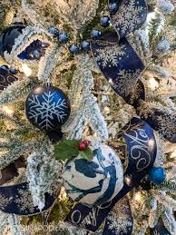 These dazzling ornaments are accented with sparkling glitter swirls. Blue And Silver Christmas Tree For The Living Room 2 Bees In A Pod