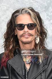 Joe Perry and Roman Perry attend the Emporio Armani show during Milan...  News Photo