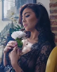 Just a few pics of @emily_juneee smelling a flower.