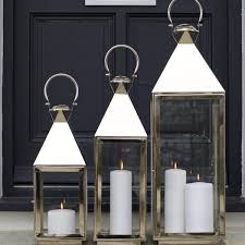 They're pretty enough to balance out other wall hangings in the living room or be displayed on their own creating the candlelit atmosphere on a patio. Tall Wooden Candle Sticks Large Pillar Candle Holders Za Za Homes