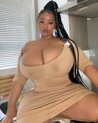 Big Ebony Woman with Extra Sized Large Breasts