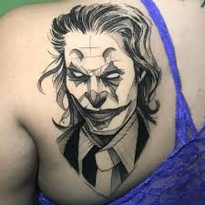 Updated 40 Audacious Joker Tattoo Designs August 2020 12.heath ledger joker tattoo designs. audacious joker tattoo designs