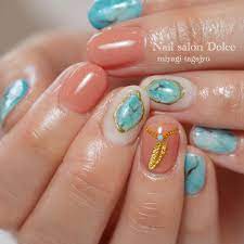 ターコイズネイル オレンジベージュがポイント ターコイズネイル ネイルデザイン ネイル