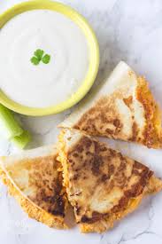 Buffalo chicken quesadillas loaded with rotisserie chicken, buffalo sauce, ranch, and lots of cheese. Buffalo Chicken Quesadilla Midgetmomma