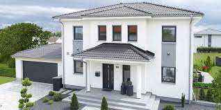 Moderne stadtvilla mit garage klinker putz fassade erker. Pramierte Hauser Stadtvilla Von Danwood Vereint Modernes Mit Klassik Bau Welt De