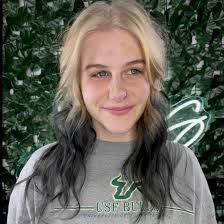 Who specializes in shag, mullet, and layered cuts in Lakeland?