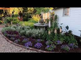 Working On The Flower Bed Behind The Chicken Coop Garden Answer Youtube Garden Answer Backyard Flowers Beds Garden Answers