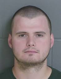 Man charged in parking garage vandalism