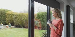 Men throwing litter through car window on cityscape background. The Window People Chesterfield