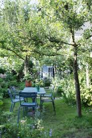33 Atemberaubende Gartenideen Im Cottage Stil Um Den Perfekten Ort Zu Schaffen 5 Beste Garten Gestaltung Sitzplatz Im Garten Cottage Garten Garten Ideen