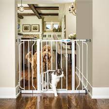 This metal pet barrier features a swinging door that opens in both directions and a pressure mounting design that adjusts to the width of your doorway, hallway or threshold. Carlson 30 X 29 44 Walk Through Pet Gate At Menards