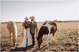 There were plenty of classic hoedown activities, like apple bobbing and hay rides. Western Wedding Inspiration Western Wedding Photographer Native Roaming Photography