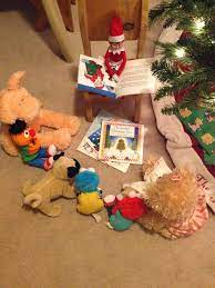 Elf On The Shelf Reading Christmas Books To Stuffed Animals Elf Elf On The Shelf Elf Activities