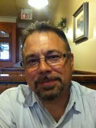 Lost stone carving post with attached photo