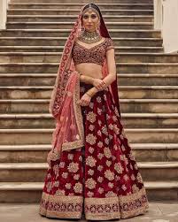 A Sabyasachi Creation Sabyasachi Indianbride Bride Maroon Red Gold Lehenga Dress Outfit Indian Bridal Outfits Indian Bridal Wear Bridal Lehenga Red