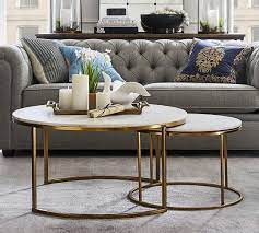 Alongside a soft, classic tufted couch, the solid shaped coffee table. Delaney Round Marble Nesting Coffee Tables Pottery Barn