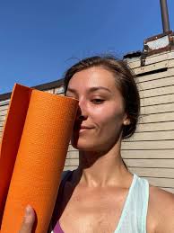 Dance class at park near lighthouse at the port