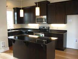 Glass fronts on the upper cabinets and window panes in. Kitchen Allenmore Heights Dark Granite Espresso Kitchen Cabinets Small House Kitchen Ideas
