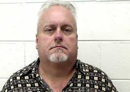 Suspect arrested taking photos at school