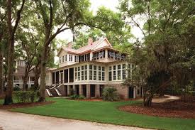 Does It Get More Southern That This Gracious Homes Are Nestled Among Century Old Live Oak Trees O Charleston House Plans Low Country Homes Country House Plans