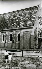 Two Children Looking At Construction Work Being Undertaken On St Thomas Church Of England In Essendon Around 193 St Thomas Church Church Of England St Thomas