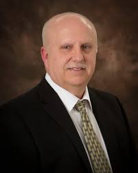 He returns to his alma mater with a diverse coaching background, having  held positions at Wittenberg, Syracuse University, Marian University,  Butler University, and Ohio Dominican University.