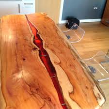 Live Edge Kitchen Island Deep Amber Resin Flows Through The Piece Like A River Comes Alive With Lighting Resin And Wood Diy Modern Home Furniture Wood Table