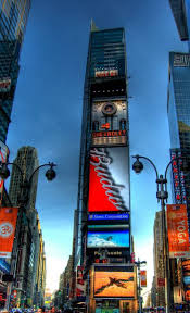 Times Square It Is A Major Center Of The World S Entertainment Industry Nowadays Began In 1907 The Annual New Year Times Square Tourist Attraction Tourist