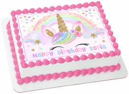 Decorating a cake with butter cream frosting designed with colorful designed swirls including the unicorn head horn made out of fondant icing the eyes on the unicorn are made of piping gel that's painting in eatable gold. Edible Unicorn Sparkles Wafer 1 4 Sheet Cake Topper Birthday Decoration Image Ebay