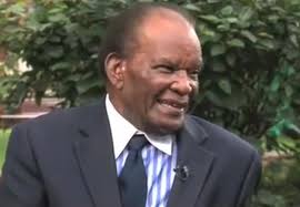 Duncan Ndegwa with his wife, Ann,