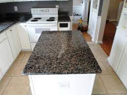 Caledonia granite is often specified for its formal appearance and durability. Caledonia Granite Granite Countertops Granite Slabs