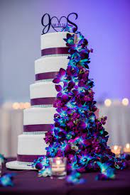 Our Wedding Cake Purple Plum Theme With Dendrobium Orchids Dyed Blue And A Few Lisianthus Fi Purple Wedding Theme Purple Wedding Cakes Wedding Cakes Blue
