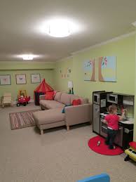 Selecting a sofa with open partitions and a light fabric helped the sofa not to feel so heavy overall as well. Pin By Mary Jllo On Educational Kid Stuff Basement Playroom Family Room Kids Basement