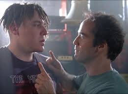 You're gonna wear the shirt of the band you're gonna go see? Don't be that  guy." That's Jon Favreau and Jeremy Piven in the classic PCU (1994)