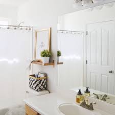 In this bathroom spotted on zevy joy, a series of baskets, mounted to the wall, is the perfect landing spot for towels of various sizes. 17 Small Bathroom Shelf Ideas