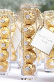 The simplest but the most exuberant way you can show your guests you care is to create a beautiful space for them on your table with a pretty elaborate centrepiece! Indian Wedding Favors Ideas Beloved Blog