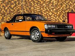 Image result for Orange 1980 PGH Acmil SA
