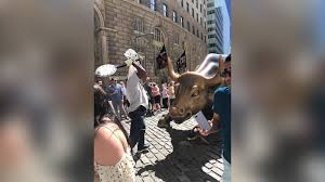 This post is about how to find the wall street bull, officially known as the charging bull, the popular bronze statue and financial icon, along with a brief history. Man Vandalizes Iconic Wall Street Charging Bull Landmark With A Banjo Police Say Abc7 New York