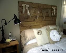 Made out of reclaimed wood. How To Make A Reclaimed Wood Headboard With New Wood For Less Than 50