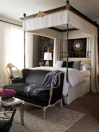 Neo Traditional Bedroom Canopy Bed Settee Sofa In Front Of Bed Seating Area In Bedroom Bedroom Design Home Contemporary Bedroom