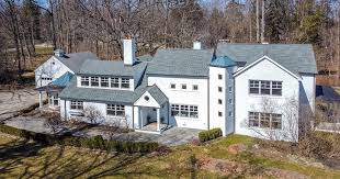 Exterior wood siding replicate rustic reclaimed wood siding and trim. On The Market Ambler Postmodern Farmhouse For Sale With A Midcentury Colonial Heart