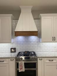 These 28 images prove that it's worth doing away with a typical stainless steel range hood for more creative options, including designs that are integrated into cabinetry. A Frame Style Wooden Range Hood Solid Hardwood Face And Trim In 2020 Wooden Range Hood Range Hood Kitchen Range Hood