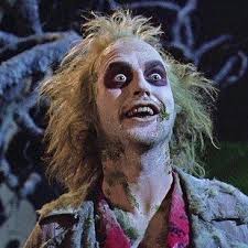 A meme template of beetlejuice shouting it's showtime! this scene is from the 1988 film, which starred michael keaton as beetlejuice. Watch One Man Get Transformed Into Three Tim Burton Characters Halloween Memes Funny Halloween Memes Halloween Funny