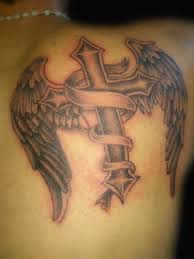 As a tattoo, the cross is typically in the middle of the wings, as if the cross itself has wings. Cross With Wings Back Tattoo By Tattoobiter On Deviantart